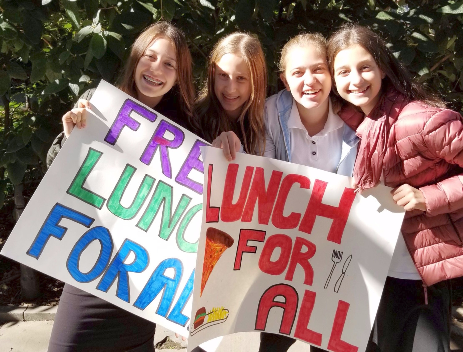 Eighth grade girls from the Manhattan Day School gotet passionate about “Free Lunch for All,” outside City Hall in Lower Manhattan.