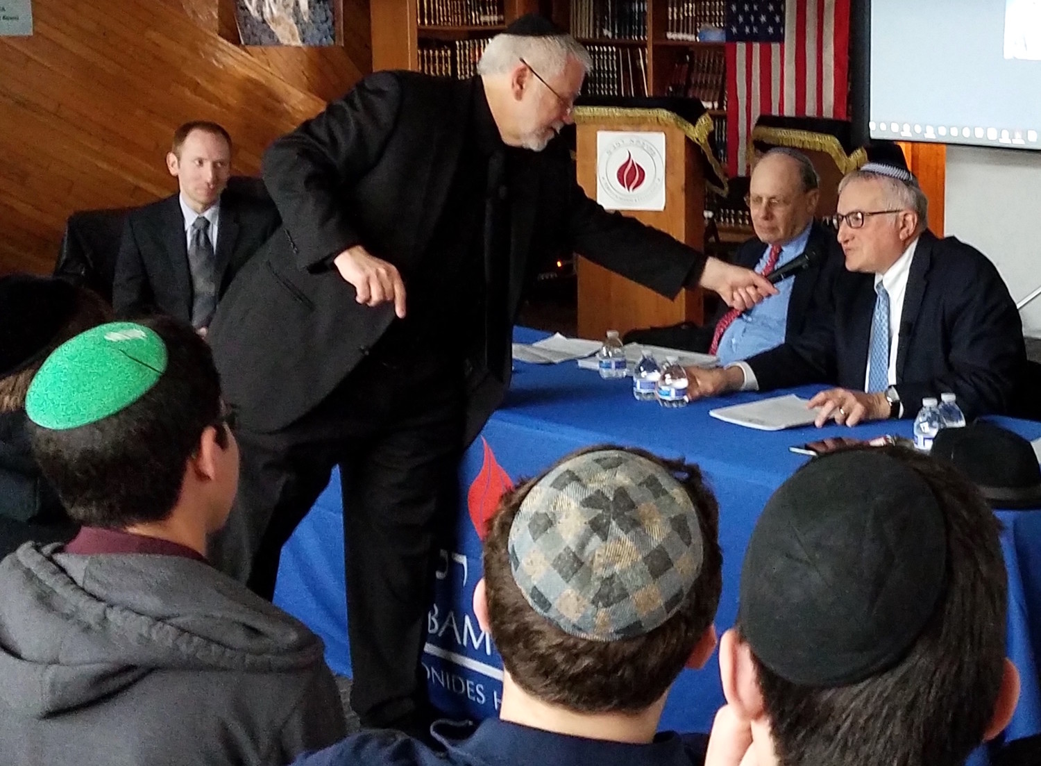 Rabbi Yotav Eliach (at right) is greeted at the launch of his book, “Judaism, Zionism and the Land of Israel."