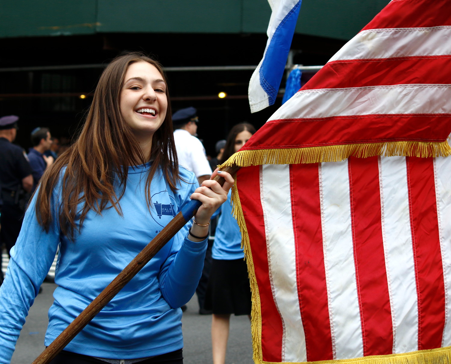 An SKA student carried the red-white-and-blue at the Celebrate Israel Parade.