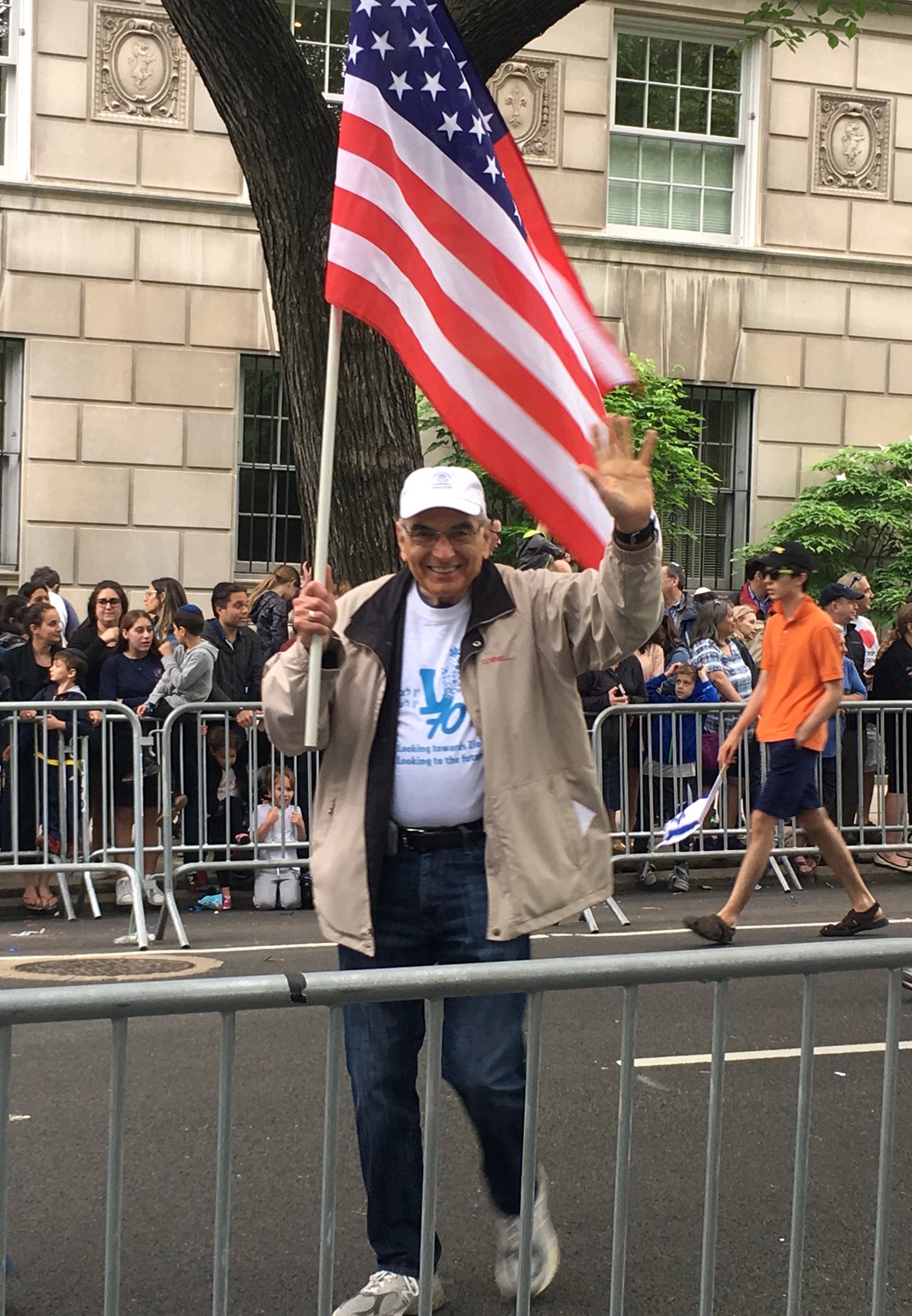 Wearing his Israel price and carrying America's colors: Barry Weintrob from Mill Basin.