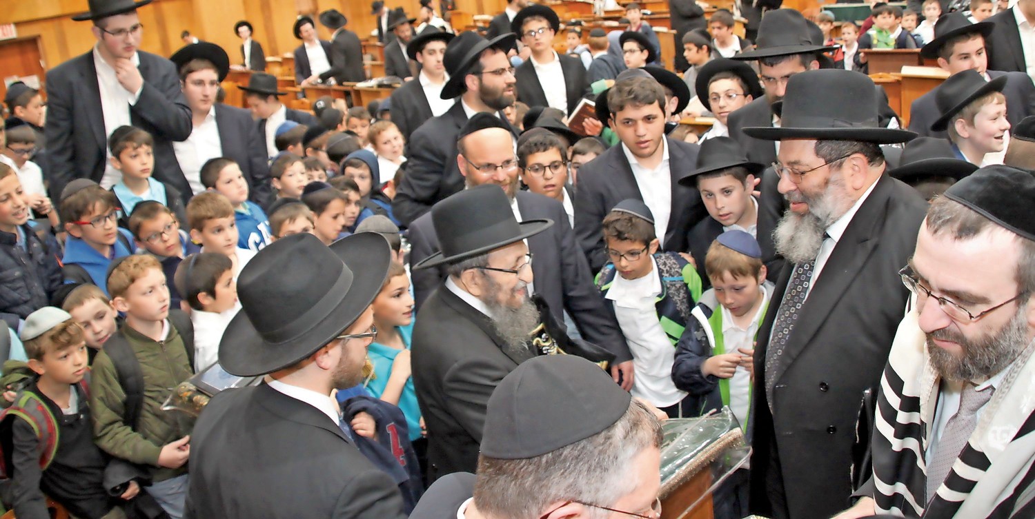 Rav Shmuel Kamenetsky, center, with Rabbi Bender, at right.
