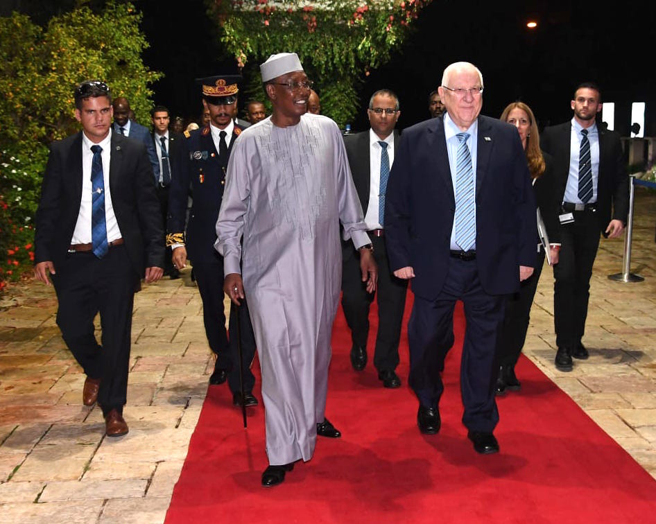 Chadian President Idris Déby walks with Israeli President Reuven Rivlin during Déby’s historic visit to the Jewish state on Nov. 25.