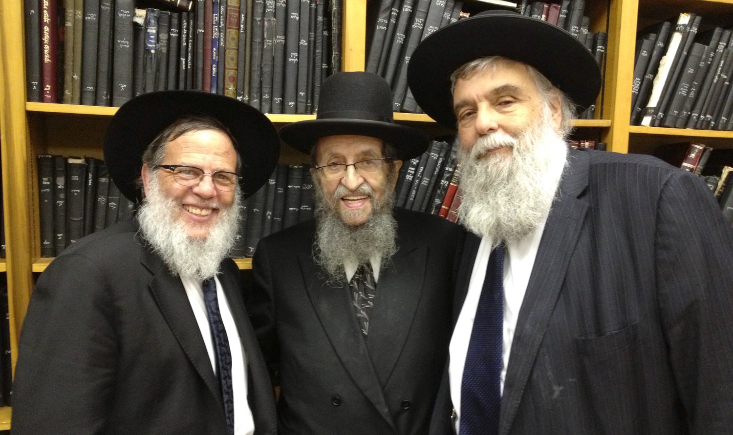 Rabbi Chanina Herzberg is pictured with, from left, Rabbis Mordechai and Shmuel Kamenetzky.