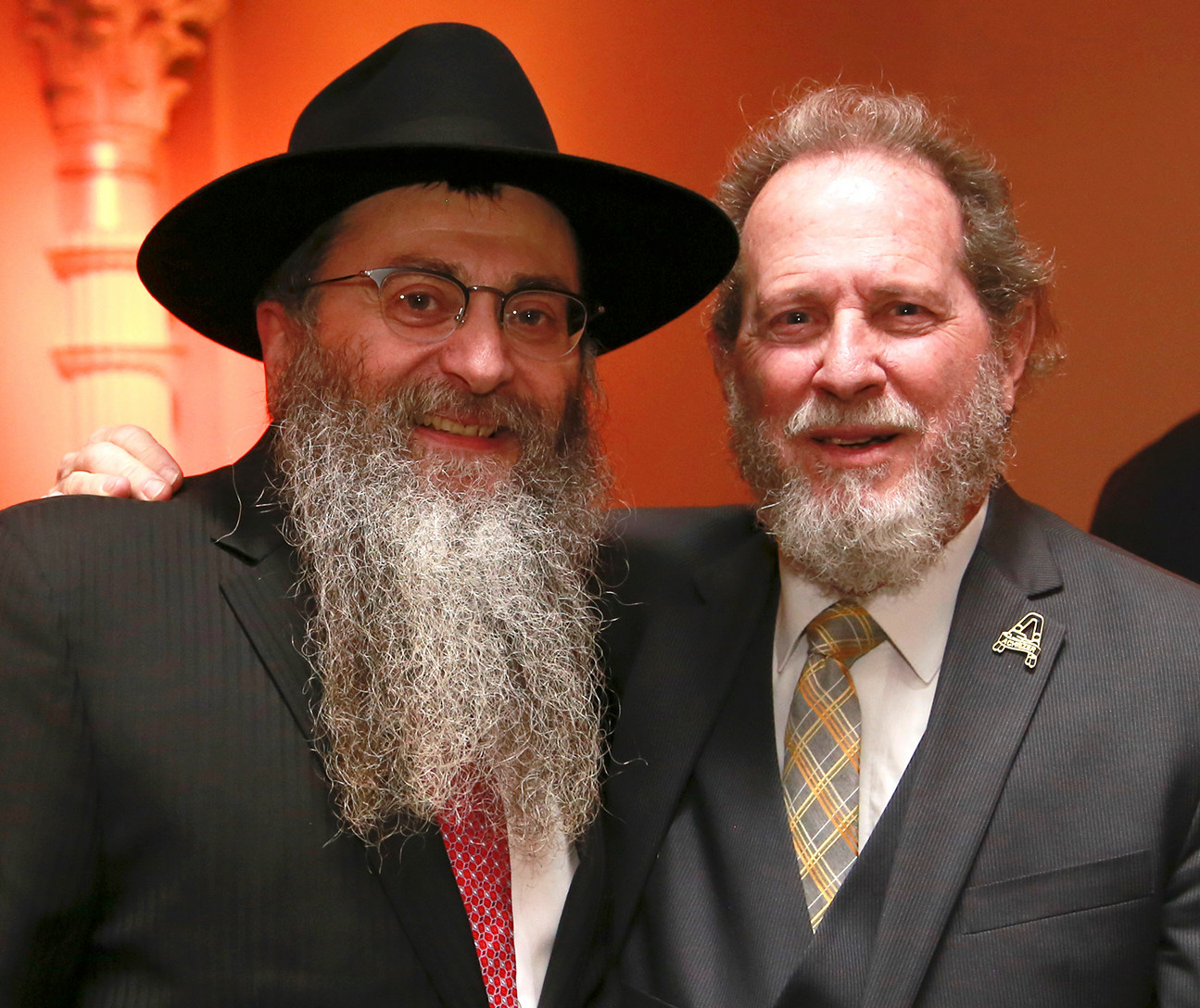 Rabbi Anchelle Perl of Chabad of Mineola and Achiezer board member Michael Krengel.