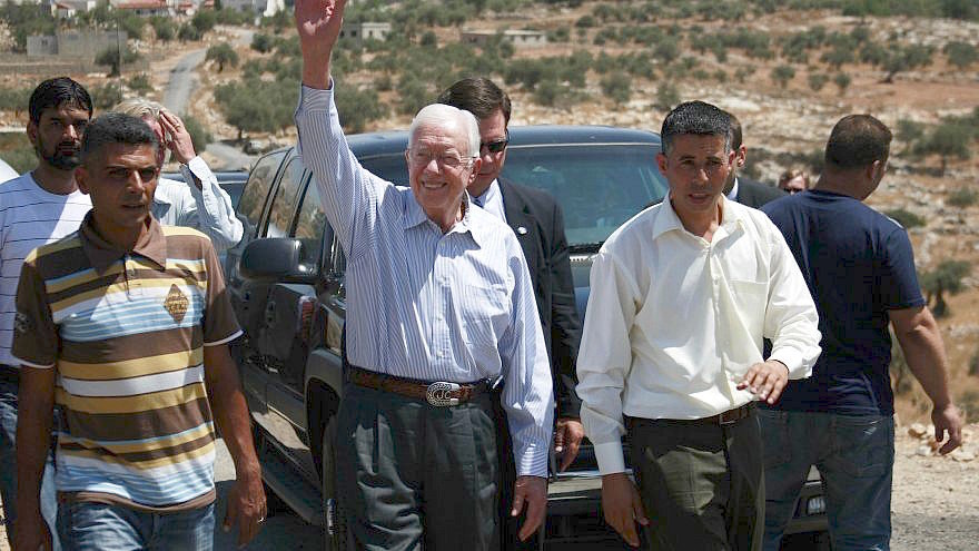 Former President Jimmy Carter with Palestinians near Bilin outside Ramallah on Aug. 27, 2009.