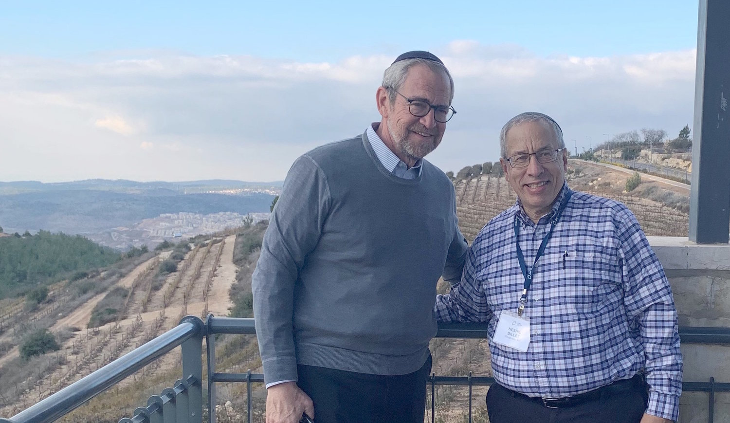 Rabbis Kenneth Hain (left) and Hershel Billet overlook the Judean Hills at the Three Boys Promenade in Gush Etzion, built in memory of the three yeshiva students killed in 2014.
