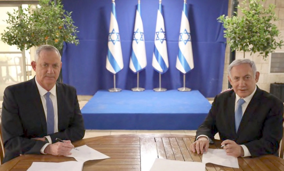 Benny Gantz and Prime Minister Benjamin Netanyahu signing the unity agreement on April 20.