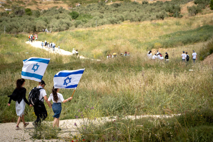 Israelis participate in a march to celebrate Israel’s 71st Independence Day near Havat Gilad in Judea and Samaria on May 9, 2019.