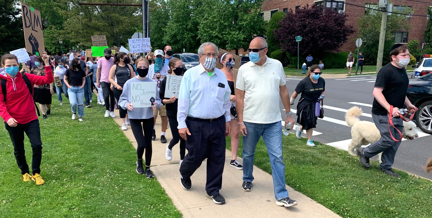 Rabbi Hershel Billet of the Young Israel of Woodmere joins Sunday’s march as it began its 2-1/3 mile trek outside Andrew Parise Park in Cedarhurst.