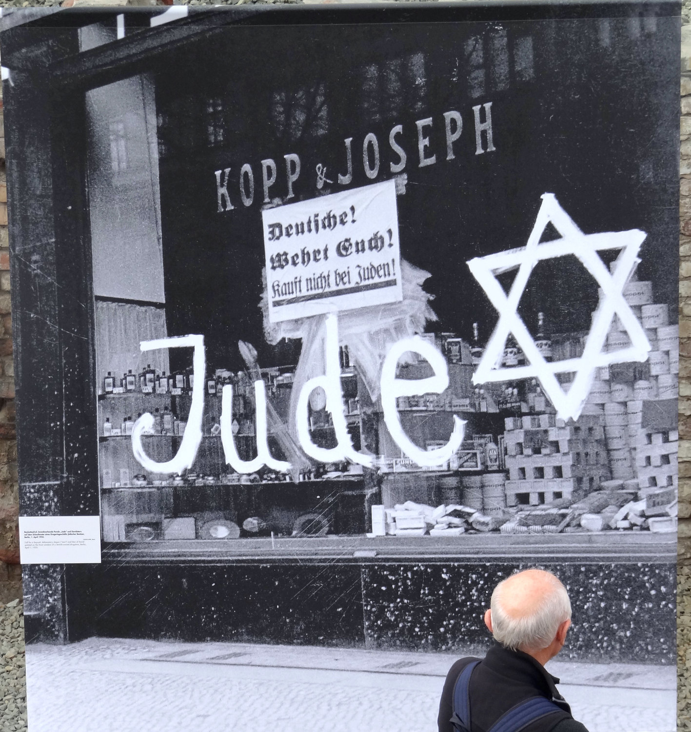 A sign on a boycotted store owned by German Jews in 1938: “Protect Yourselves, Don’t Buy from Jews.”