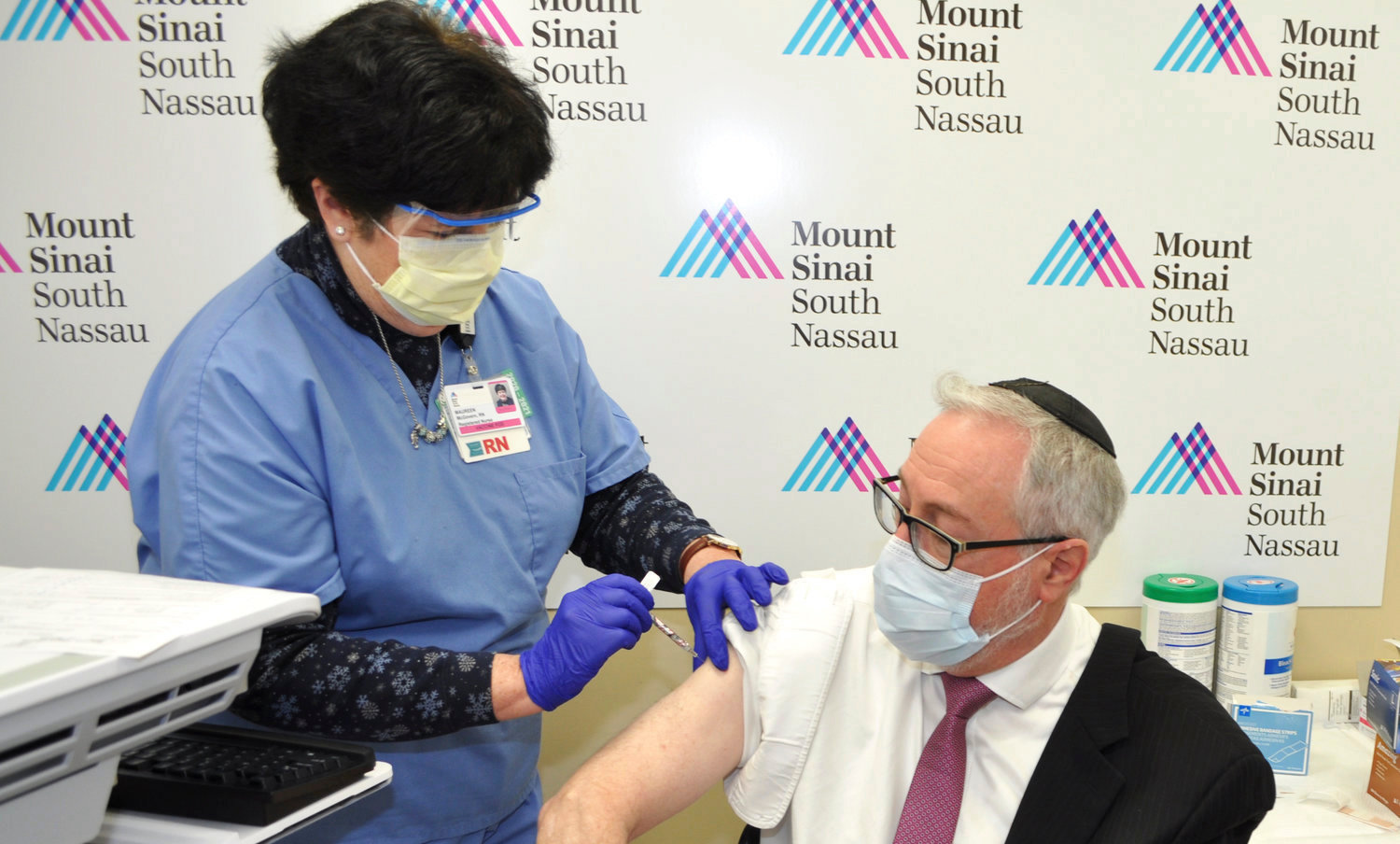 Rabbi Dr. Aaron E. Glatt is pictured receiving a Covid-19 vaccine at Mount Sinai South Nassau.
