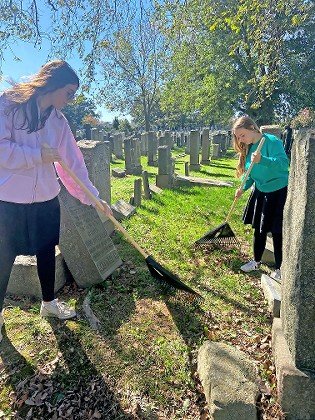 SKA seniors clean the Hebrew Free Burial Society cemetery on Staten Island.