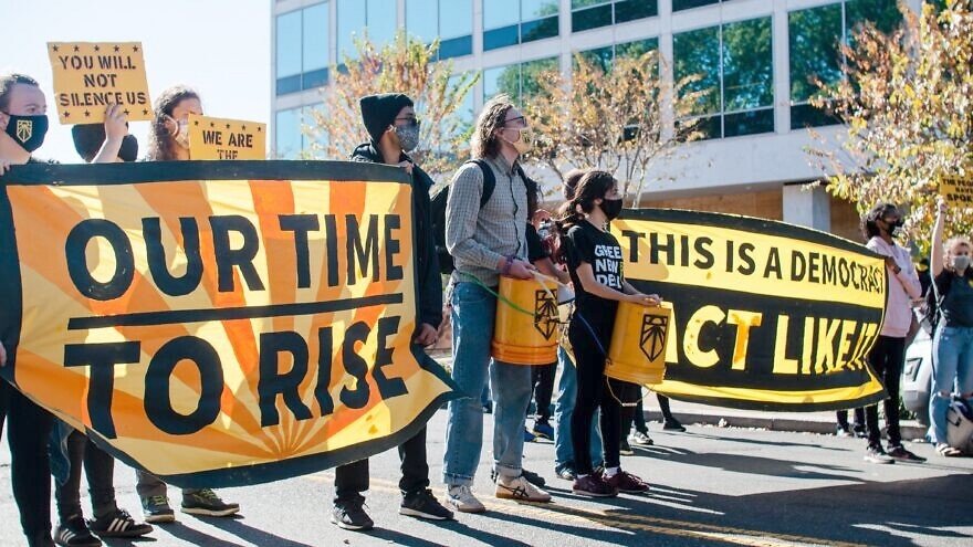 A demonstration by Sunrise DC, a progressive climate activist group.
