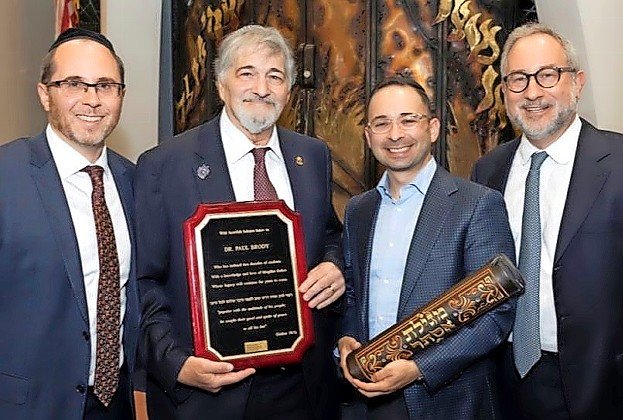 From left: Rabbi Adam Acobas, NSHA MS Principal; Dr. Paul Brody; Great Neck Synagogue chazzan Yitzy Spinner; Rabbi Dr. Jeffrey Kobrin, NSHA rosh ha yeshiva and head of school.