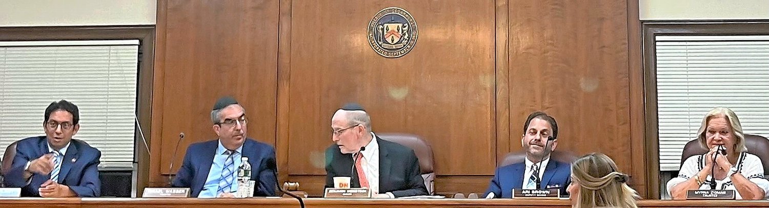 Trustees voted Monday to support a controversial development project on Pearsall Avenue. From left: Trustees Daniel Plaut and Israel Wasser, Mayor Benjamin Weinstock, and Trustes Ari Brown and  Myrna Zisman.
