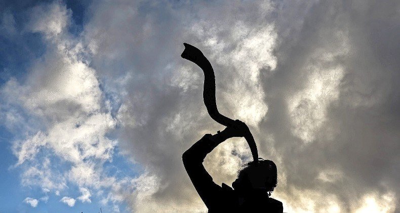 A shofar is blown art the Rashbi gravesite in Meron in northern Israel.