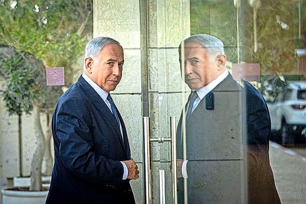 Israeli Prime Minister-elect Benjamin Netanyahu arrives at a Jerusalem hotel to conduct coalition talks on Nov. 6.