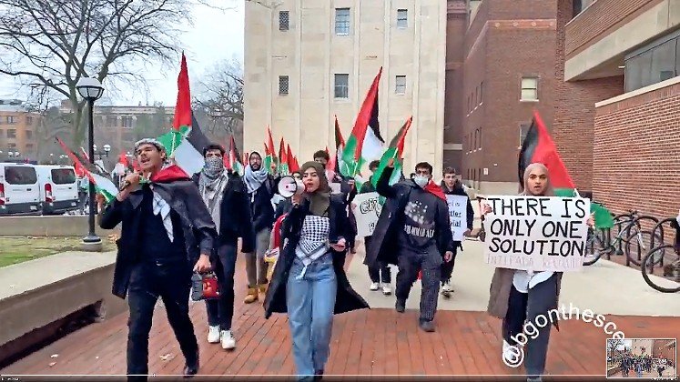 Marchers parading with Palestinian flags at the University of Michigan in Ann Arbor call for a Jew-killing intifada that would judenrein the land of Israel “from the river to the sea.”