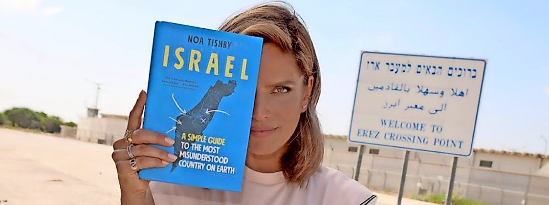 Noa Tishby, special envoy for combating antisemitism and delegitimization of Israel, with her 2021 book, “Israel: A Simple Guide to the Most Misunderstood Country on Earth.”