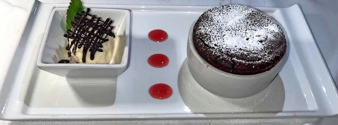 Don’t think about desert — just order the Chocolate Soufflé.