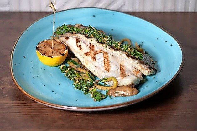 For a proper fish entrée, there’s Grilled Branzino.