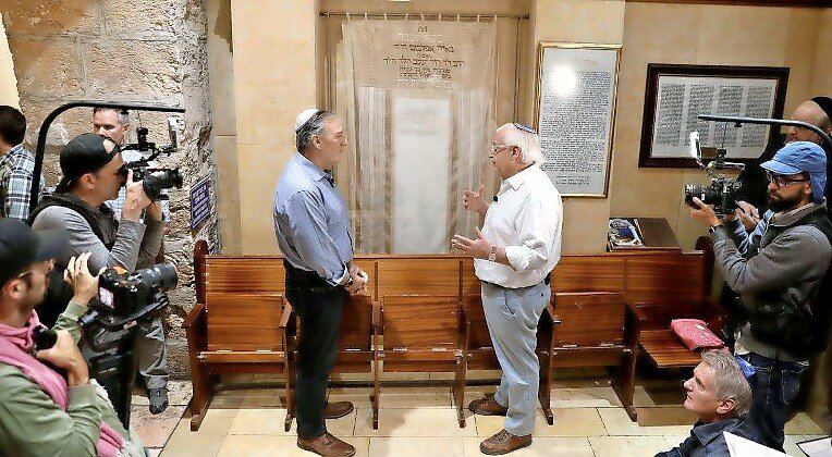 Former Ambassador to Israel David Friedman and former Secretary of State Mike Pompeo visit Rachel’s Tomb in Bethlehem. The curtain in the background was recut from the wedding dress of Friedman’s cousin’s fiancé, who along with her father was murdered in a terror attack on the eve of her wedding.