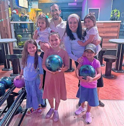 The Wernick family from East Meadow enjoying the Back-to-School Bowling event on Sunday at Woodmere Bowling.