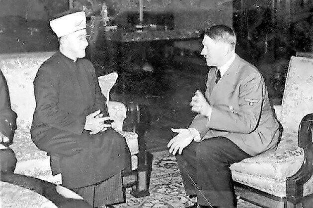 Grand Mufti of Jerusalem Haj Amin al-Husseini meets with Adolf Hitler in 1941.
