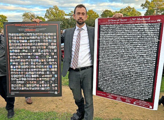 Rabbi Ya’akov Trump of the Young Israel of Lawrence-Cedarhurst spoke of two posters displayed in his shul — one with 1,707 faces of people slain over 23 years, and one with faces representing the 1,400 people murdered by Hamas in one day, on Oct. 7.