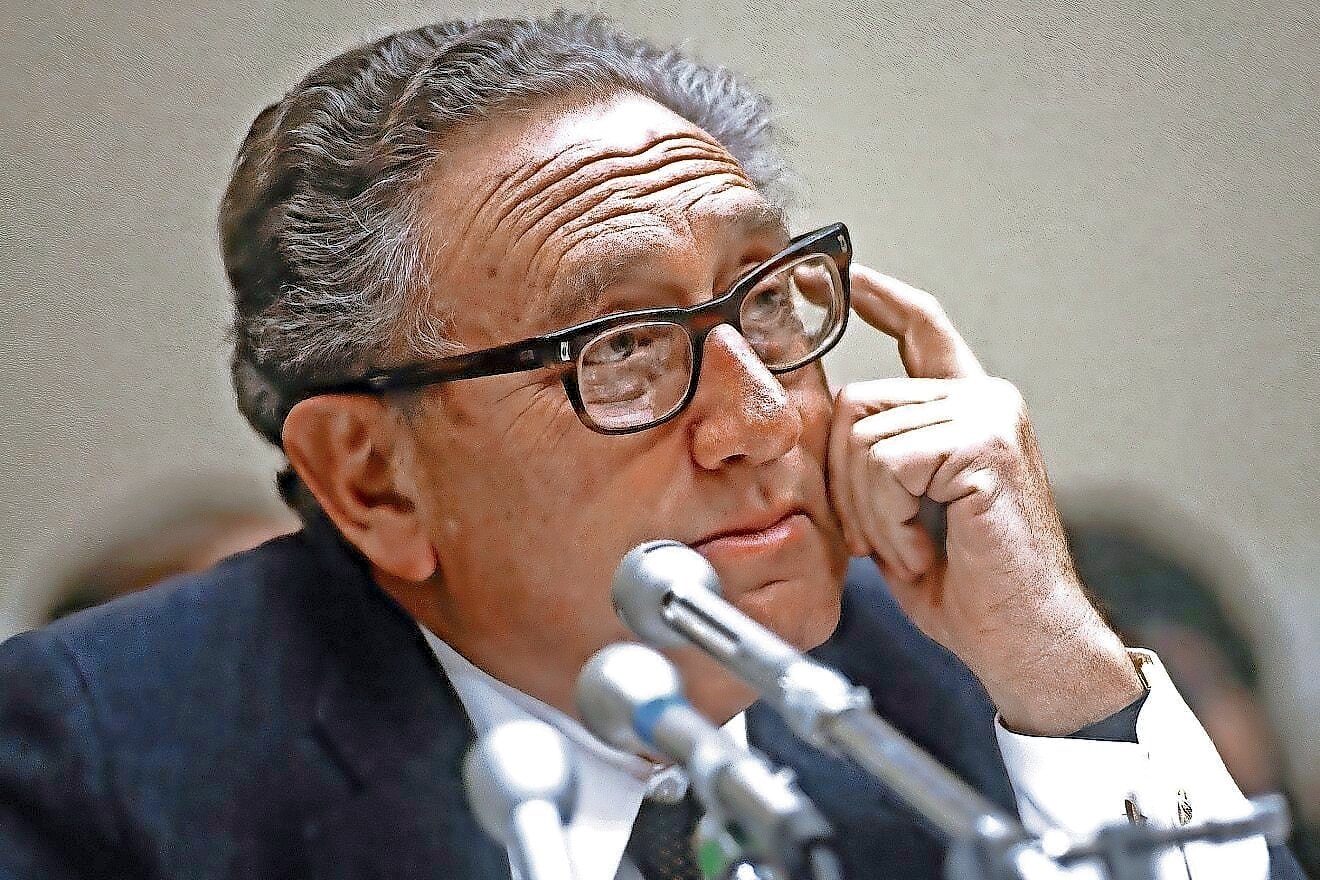 Henry Kissinger appears before the House Foreign Affairs Committee on Feb. 8, 1984.