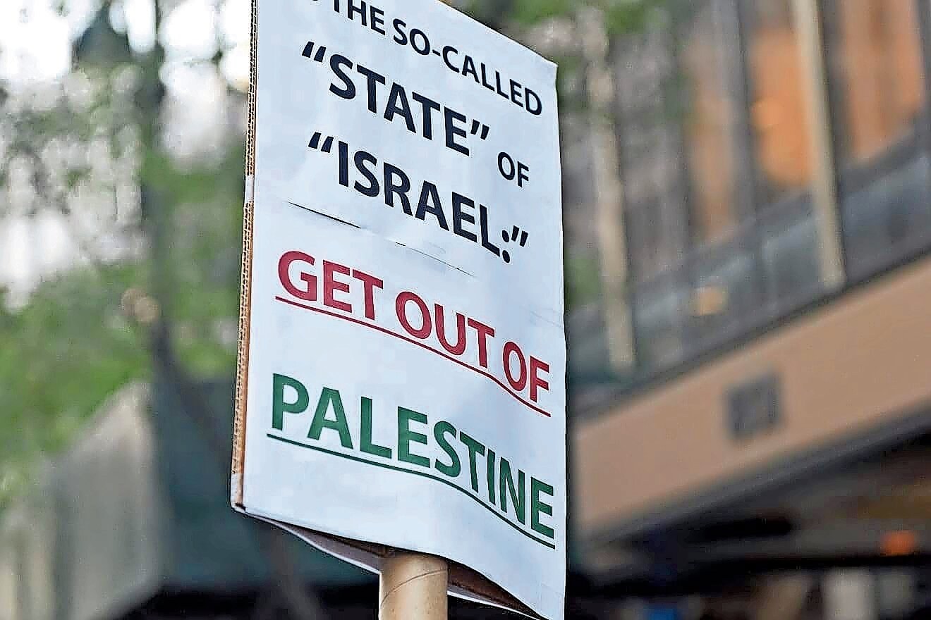 Signs held by Students for Justice in Palestine and other anti-Israel organizations during a prior “Day of Rage.”