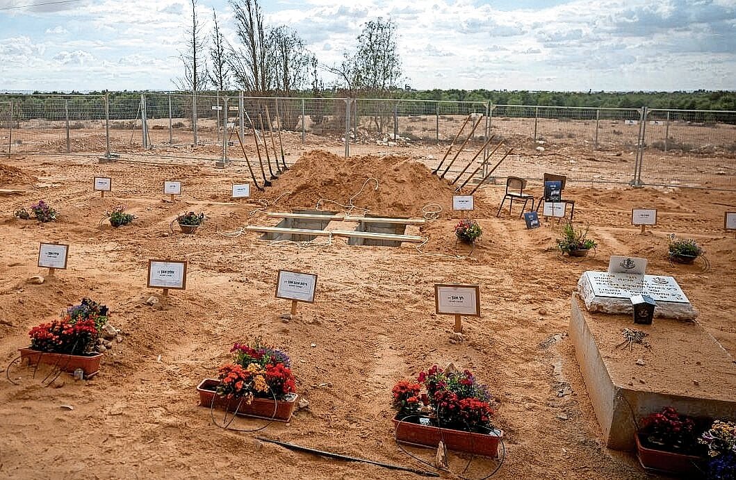 Graves of Kibbutz Be’eri residents who were murdered by Hamas terrorists on Oct. 7.