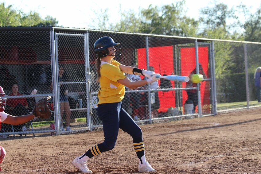 Kern Valley’s Mille Bustamante connects with the pitch in the recent game versus South High.