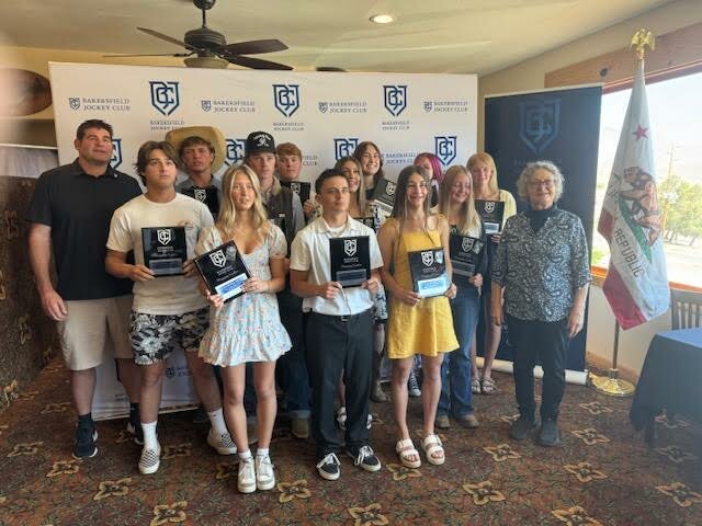 The 12 Bakersfield Jockey Club Award winners from Kern Valley. Far Left is guest speaker Stephen Neal and far right is Pam Smith who sponsored breakfast for the event.