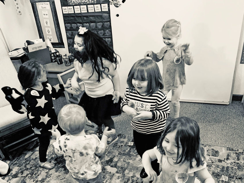 Preschool students enjoy a dance party in February 2020, before &ldquo;social distancing&rdquo; came along.