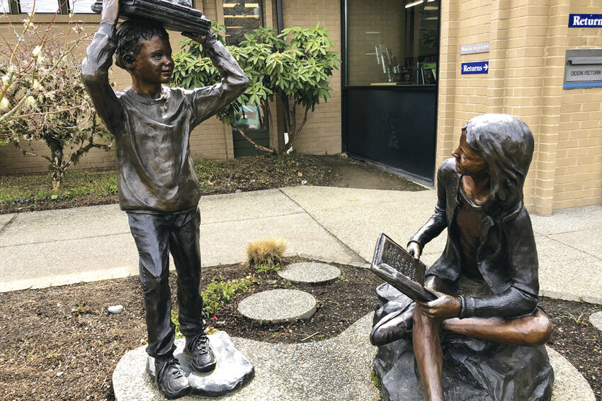 John Jewell&rsquo;s sculpture &ldquo;Balancing the Books,&rdquo; was commissioned and paid for by the Friends of the Key Peninsula Library.