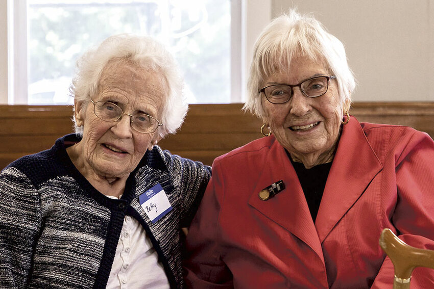 Betty Boyd (left) and Mar Hoey seated together at a recent gathering of the Burley Lagoon history group.