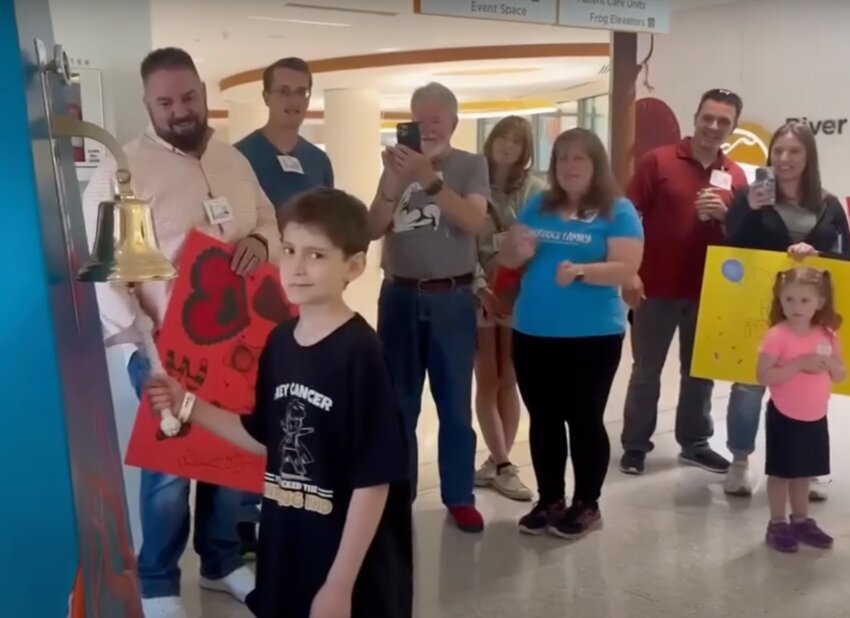 After 30 radiation doses, 44 chemo infusions, five surgeries, three blood transfusions, 51 inpatient hospital days, 87 outpatient appointments and seven trips to ER, Brayden VanderDoes, age 9, rings the bell at Seattle Children&rsquo;s Hospital in August signaling the end of more than a year of treatment for a brain tumor.