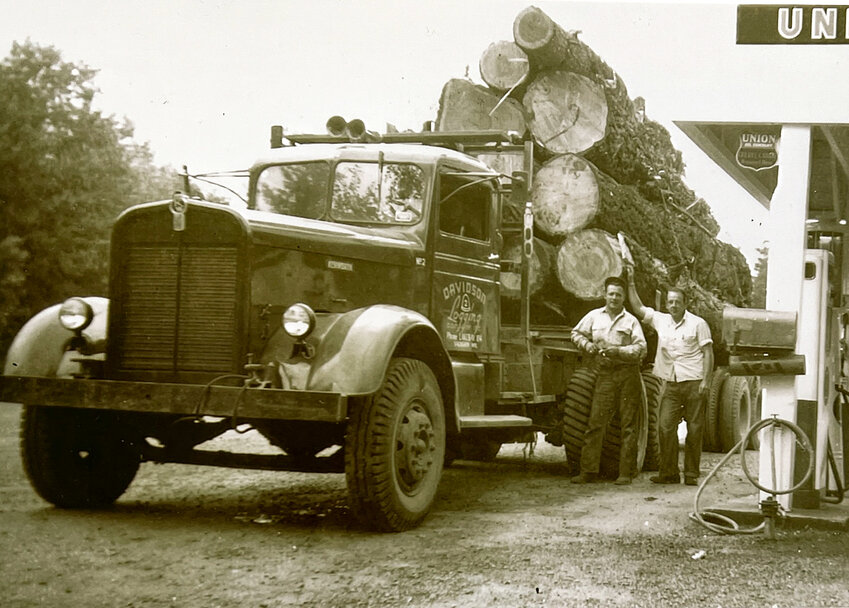 Ralph Collins (right) with a driver for the Davidson Logging Co., 1940s.