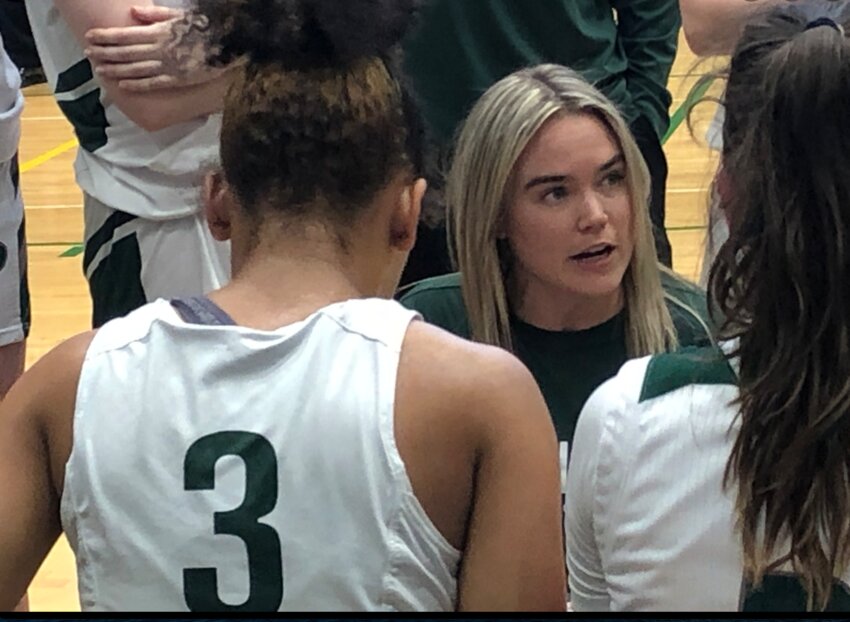 Coach Hannah Lekson courtside last season.