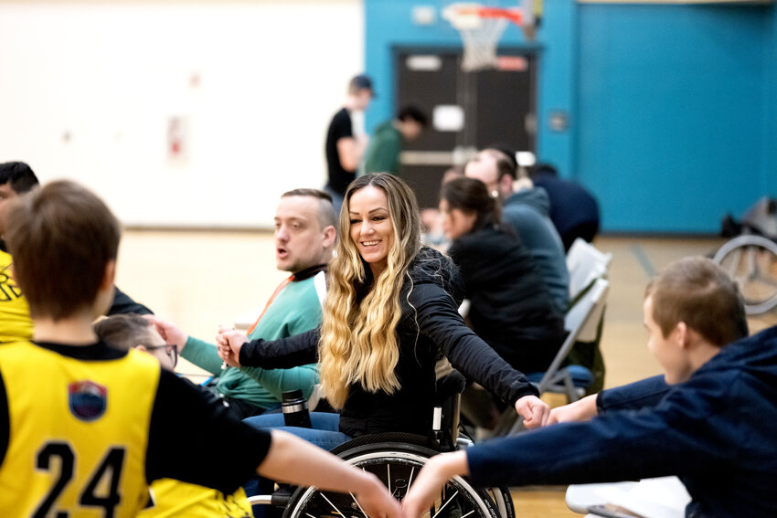 Blunk hopes to get a truckload of adaptive wheelchairs, take them to schools, and give students the experience of playing wheelchair basketball in PE classes.