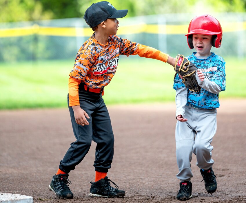 Thanks to Key Peninsula Little League volunteers, thousands of KP kids have experienced moments like 6-year-old Jacob tagging his opponent out in 2023.