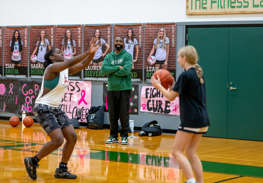 Coach Nelson Garbutt watches as PHS Seahawks Senior Grace Richardson leads open gym in early October.