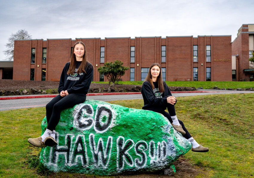 PHS Freshman Lily Robles (left) and Sophomore Mya Robles show their Seahawks Girls Wrestling pride on the campus of Peninsula High School.