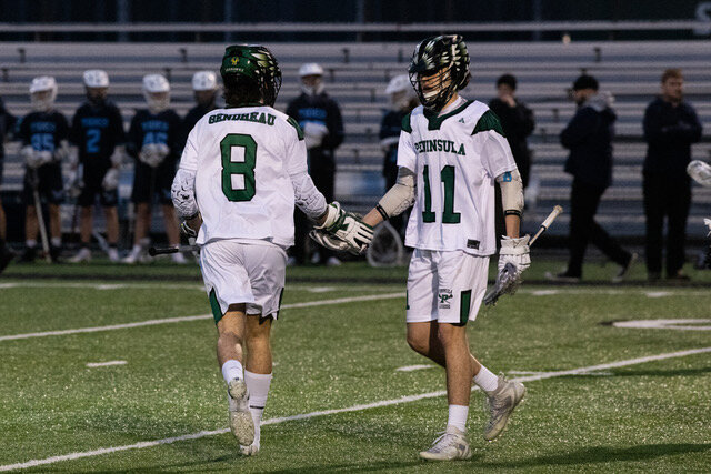 PHS Senior Captains Nate Gendreau No. 8 and Nathan DeLong No. 11 post action versus Gig Harbor High School at Roy Anderson Field March 22.