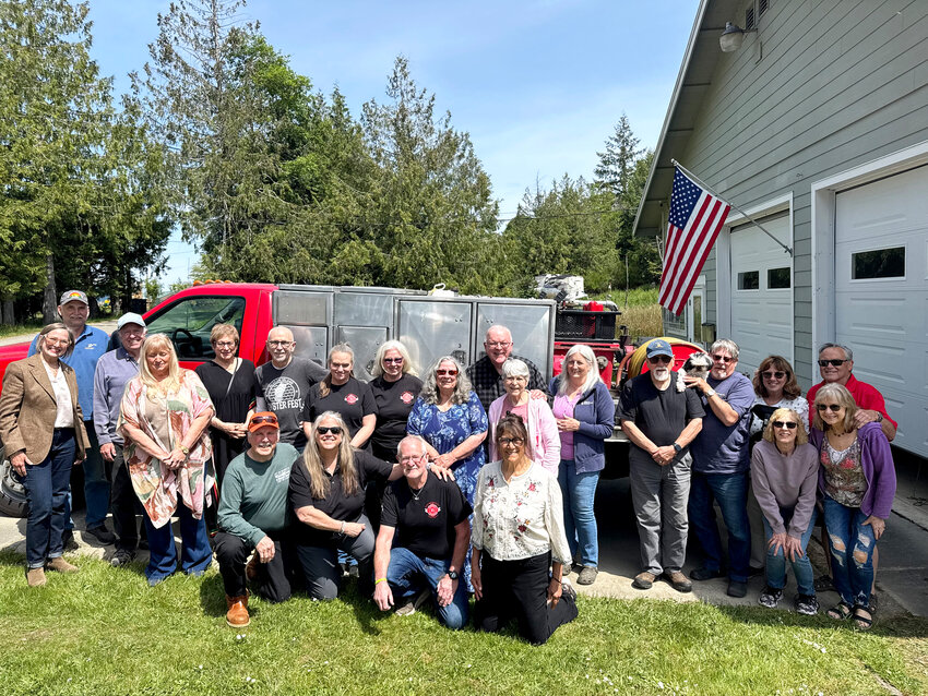 Herron Island hosted a lunch May 9 to celebrate and thank Fire District 16. Several Key Peninsula firefighters attended, and a plaque was presented by the Herron Island Boosters Club.