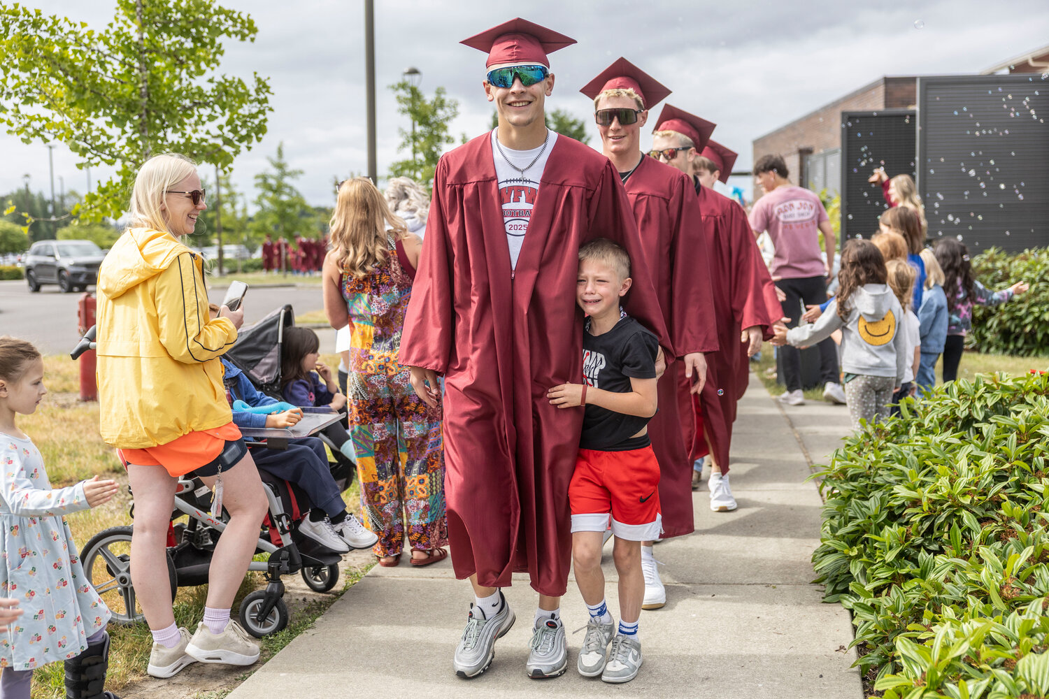 In Focus: W.F. West class of 2026 completes traditional senior walk ahead of graduation