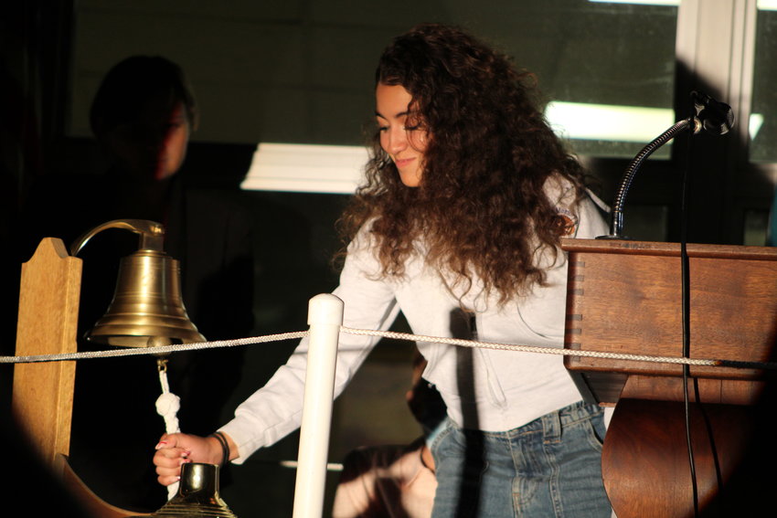 Sophia Bonilla rang the bell to honor her uncle, Seaford High alumnus Robert F. Sliwak, who died in the 9/11 attacks.