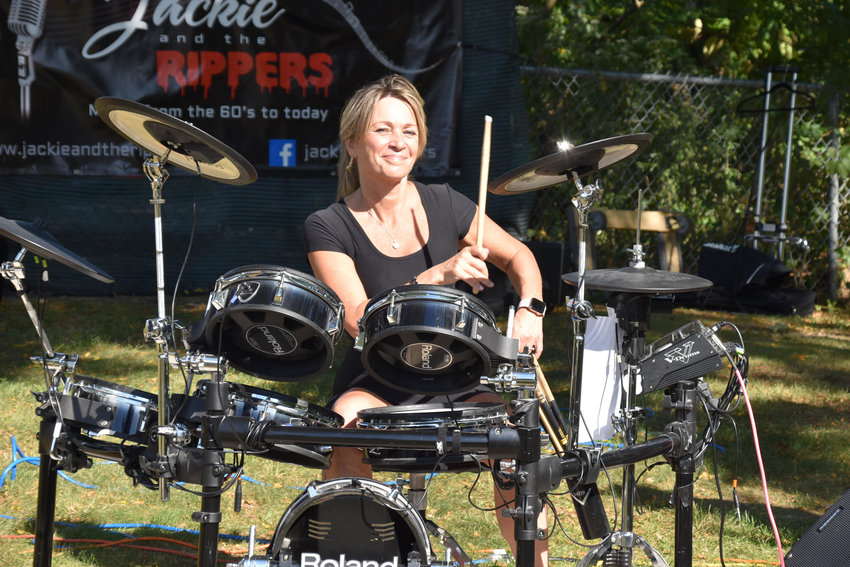 Chris Steinert, of Massapequa, was on drums, above, at a fall festival in Wantagh last Saturday.