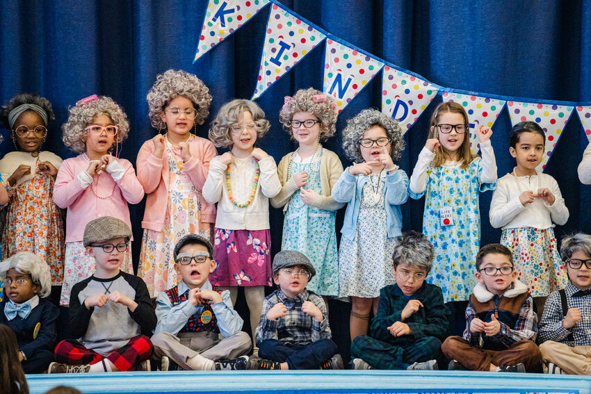 The 100 day of school celebration concluded with a musical performance. Kindergarteners sang ‘This Little Light of Mine’ and ‘What a Wonderful World.’